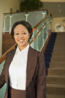 African businesswoman on staircase