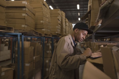 Black man working in warehouse