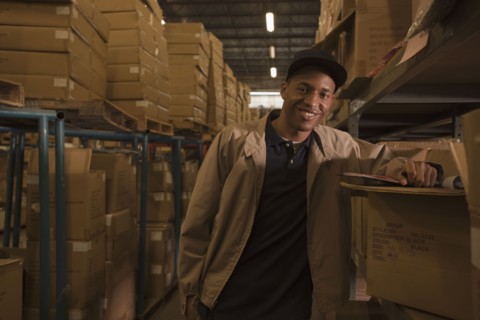 Black man working in warehouse