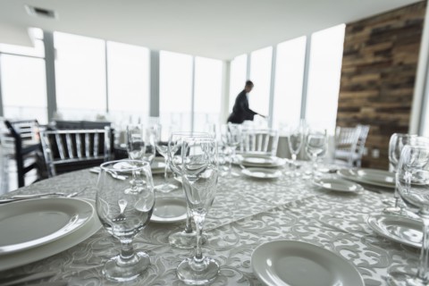 Table setting in empty restaurant