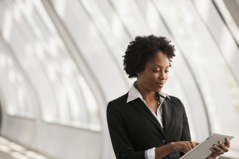 African American businesswoman using digital tablet
