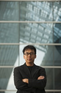 Asian businessman with arms crossed