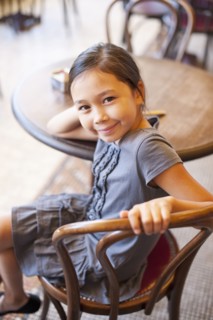 Asian girl sitting in cafe