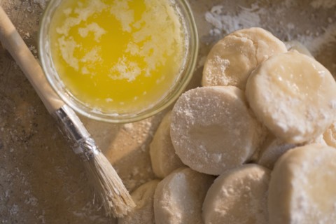 Close up of biscuit rounds and butter