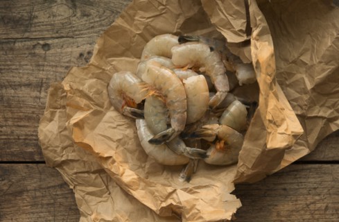 Raw shrimp in butcher paper