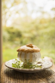 Plate of baked pie and herbs