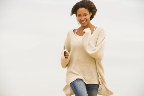 African American woman walking outdoors
