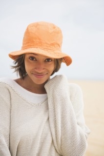 African American woman wearing sun hat