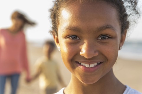 Portrait of smiling girl at beach
