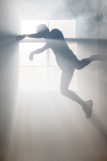 Shadow of Caucasian man at window
