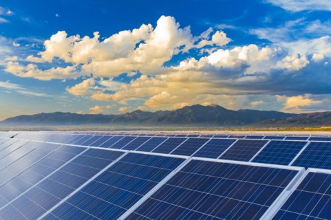Mountains behind solar panels
