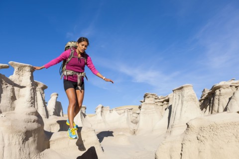 Native American woman hiking in desert
