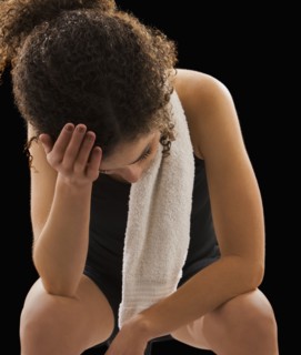 Caucasian woman tired after exercise