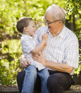 Caucasian grandfather talking with grandson