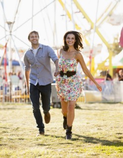 Caucasian couple enjoying carnival