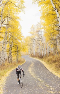 Caucasian cyclist on rural road