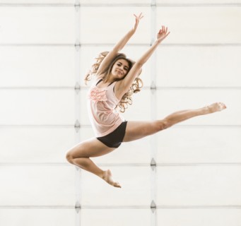 Hispanic dancer practicing in studio
