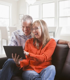 Caucasian couple using tablet computer