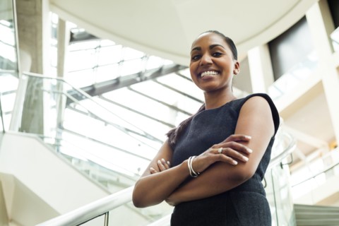 Indian businesswoman smiling in office