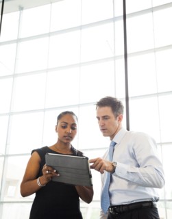 Business people using digital tablet