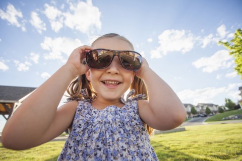 Caucasian girl wearing sunglasses outdoors