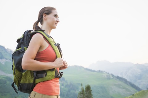 Caucasian hiker wearing backpack