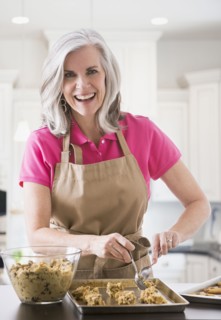 Portrait of Caucasian woman baking cookies