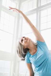 Caucasian woman practicing yoga