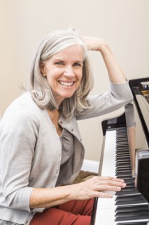 Caucasian woman playing piano