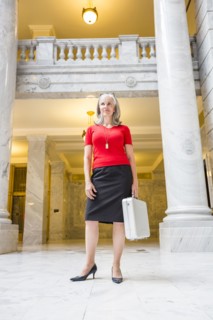 Caucasian businesswoman with briefcase in courthouse