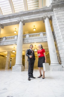 Business people talking in courthouse
