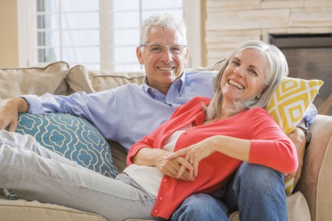 Caucasian couple relaxing on sofa