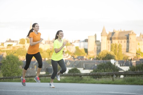 Caucasian women jogging outdoors
