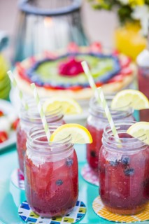Fruit juice in jars outdoors