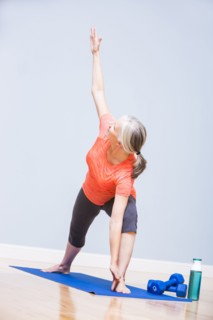 Caucasian woman practicing yoga