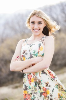 Caucasian teenage girl standing outdoors