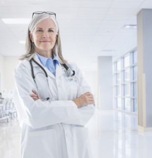 Portrait of smiling Caucasian doctor