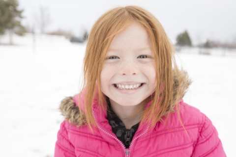 Portrait of smiling girl in winter