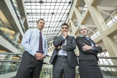 Portrait of serious business people in lobby