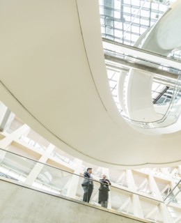 Business people talking in lobby