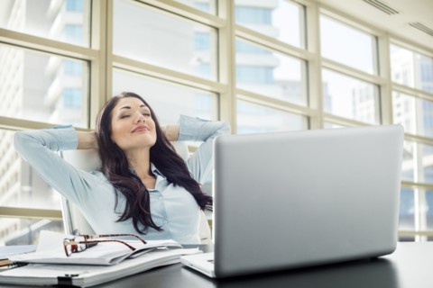 Caucasian businesswoman unwinding in office