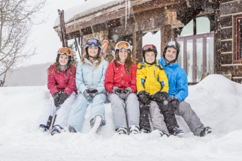 Portrait of smiling Caucasian family on winter vacation