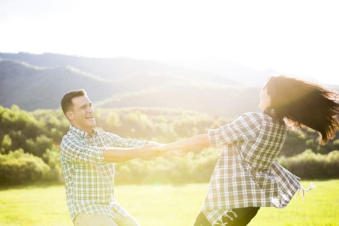 Couple dancing in park