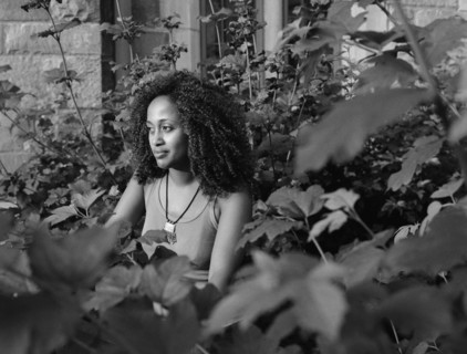 Mixed race woman in garden
