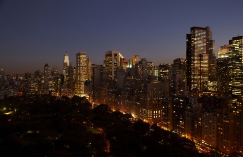 Sunset and illuminated cityscape