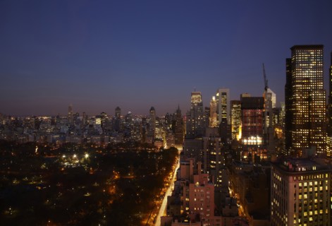 Sunset and illuminated cityscape