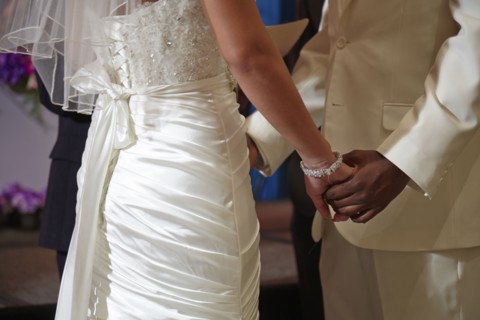 Newlywed couple dancing at wedding