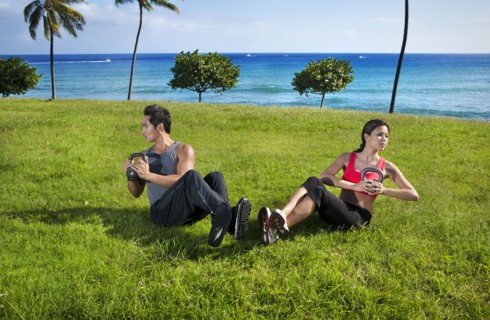 Couple exercising together at waterfront