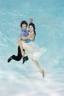 Couple dancing under water