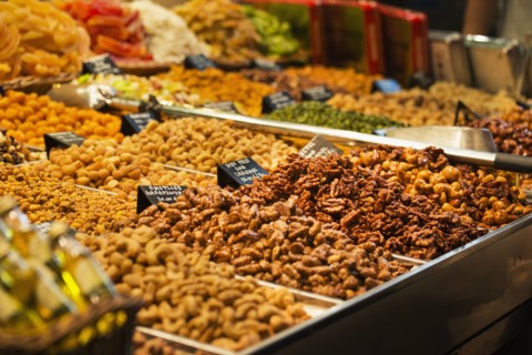 Bins of nuts at market